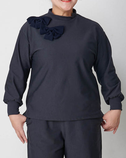 Moisture-wicking, heat-generating mock neck pullover with removable ribbon