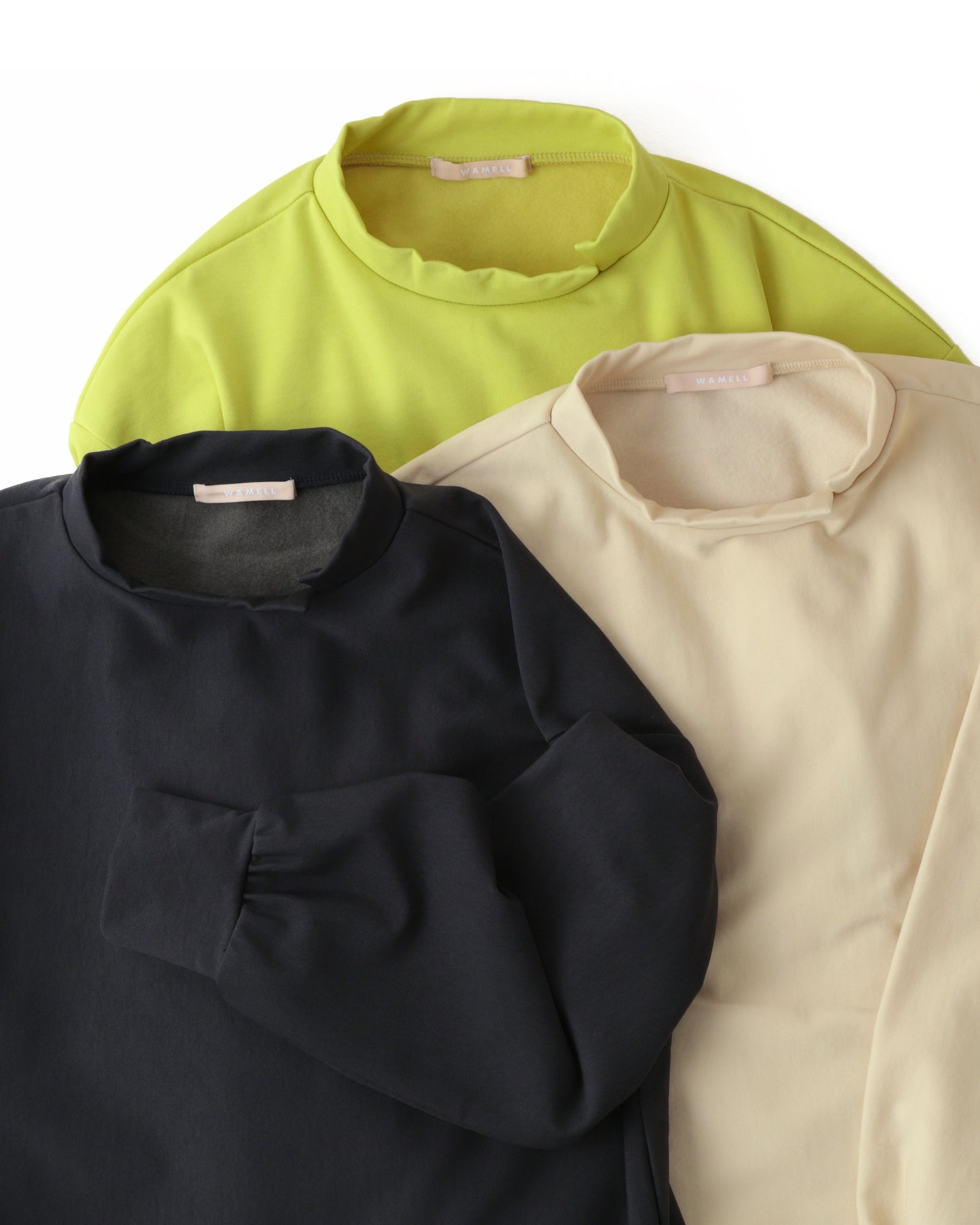 Moisture-wicking, heat-generating mock neck pullover with removable ribbon